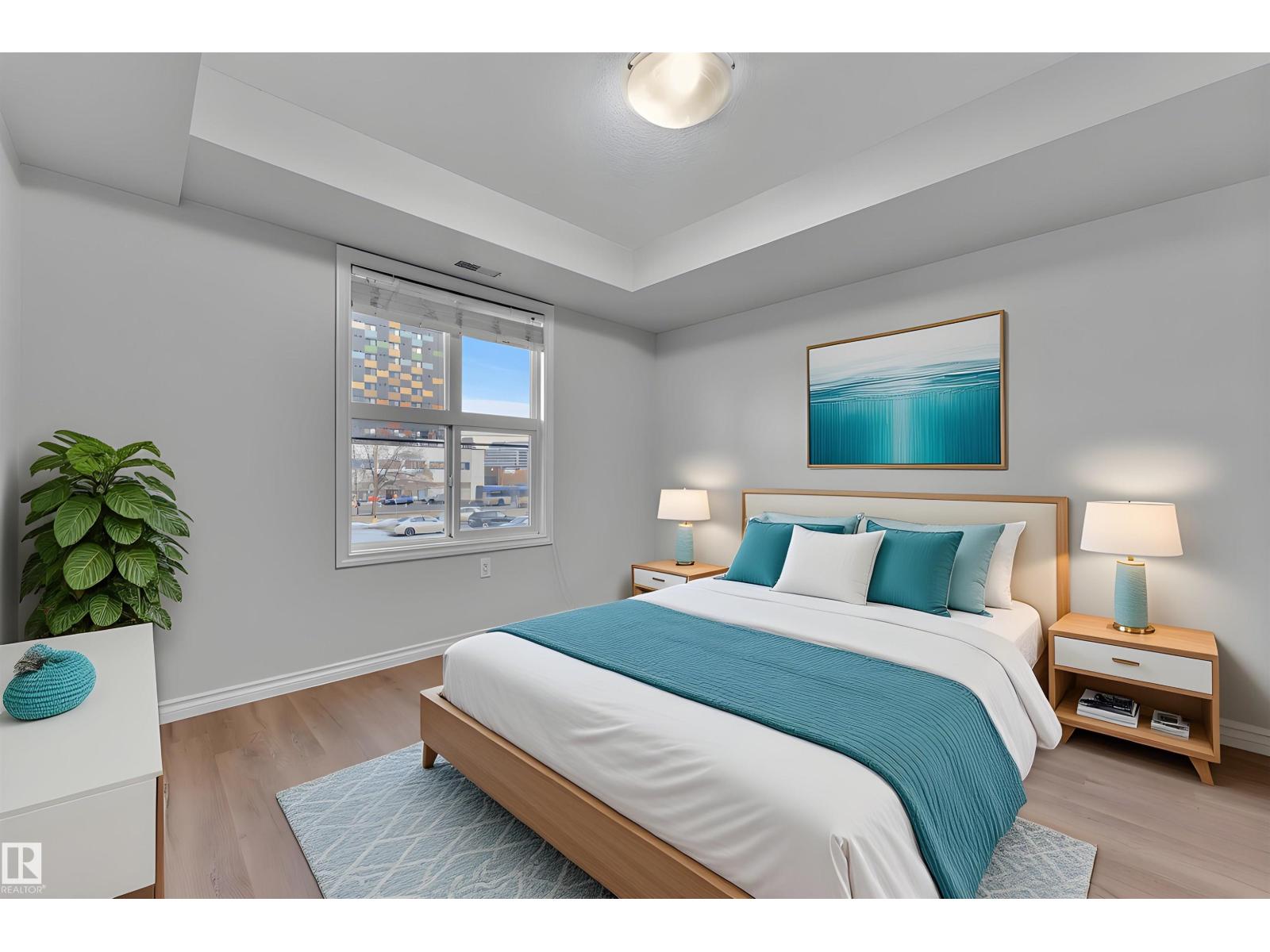 #210 10118 106 AV NW