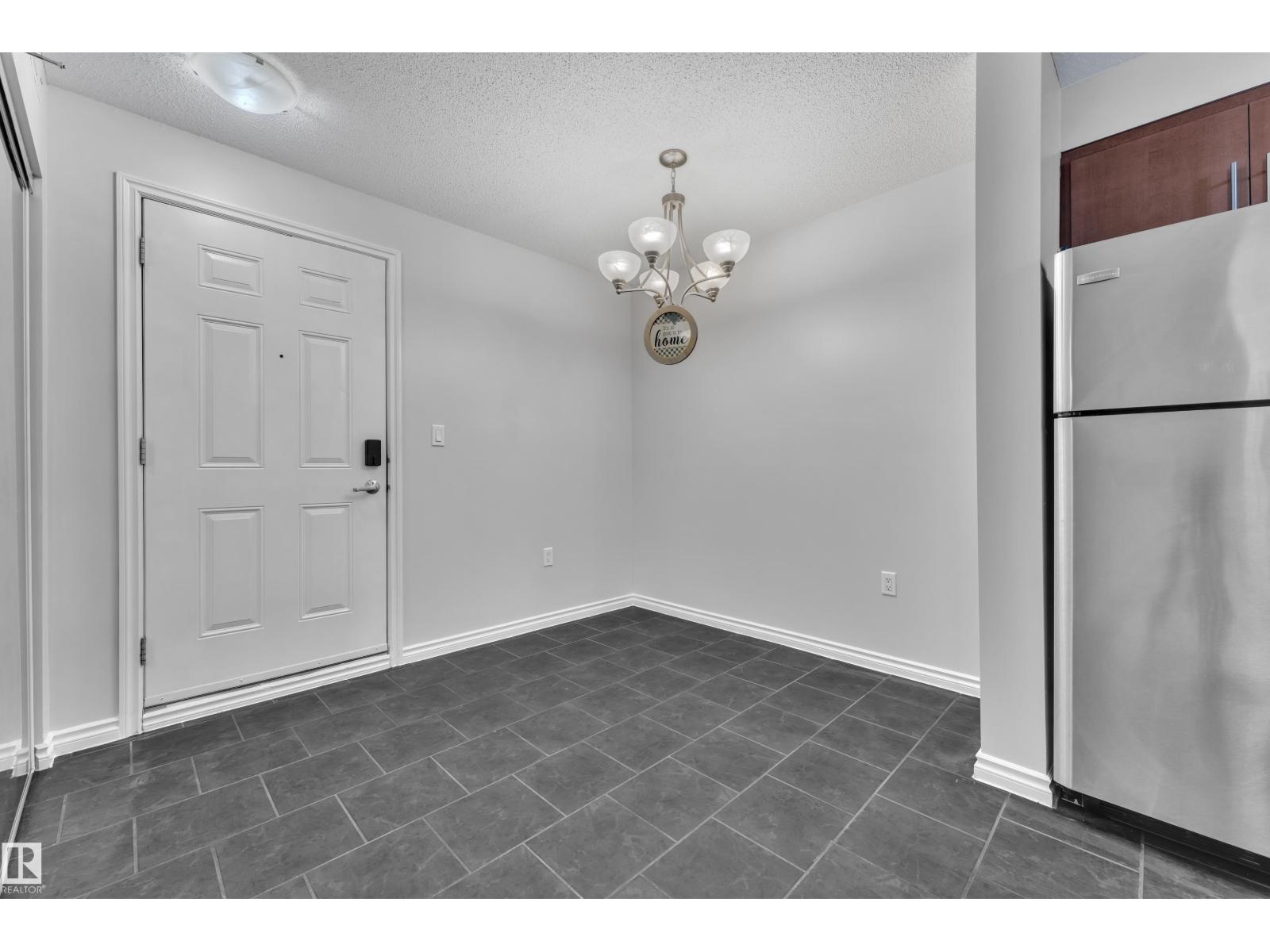 #210 10118 106 AV NW