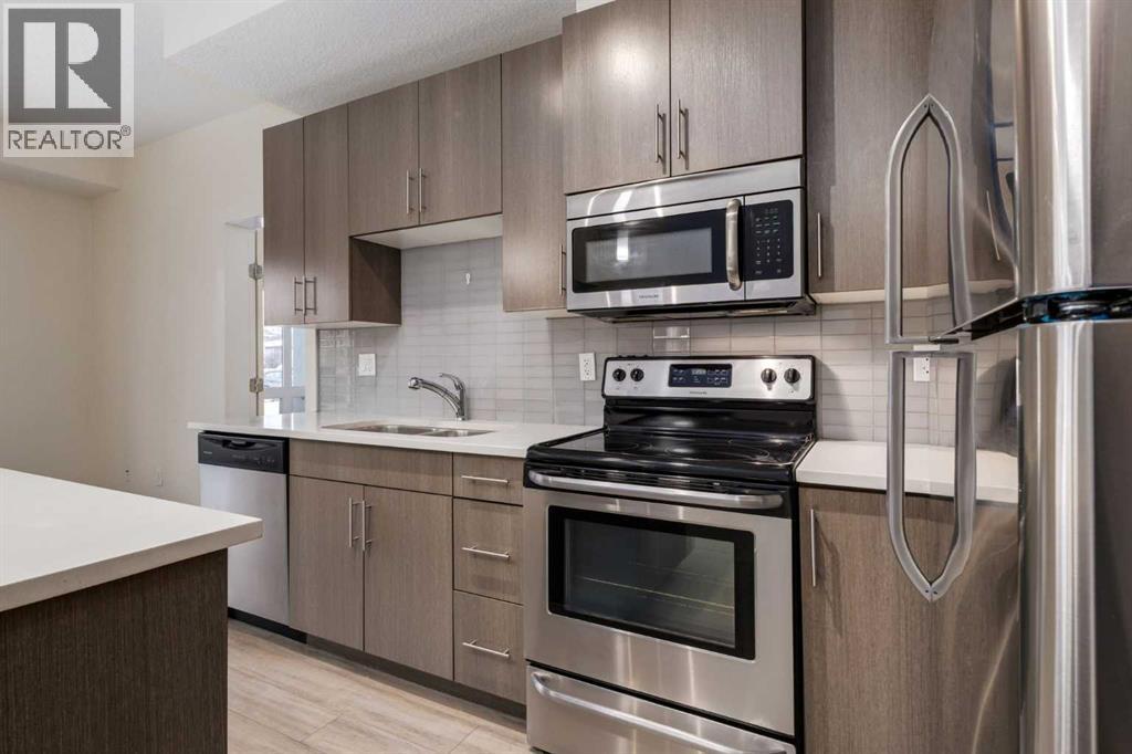 102, 15233 1 Street SE