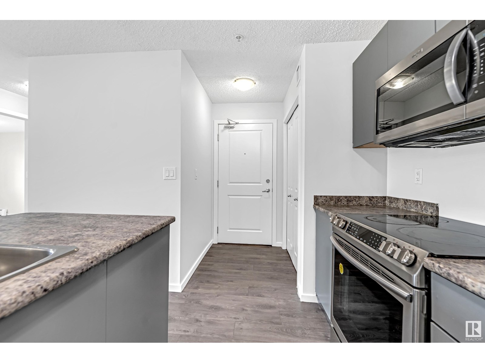 #115 3357 16A AV NW