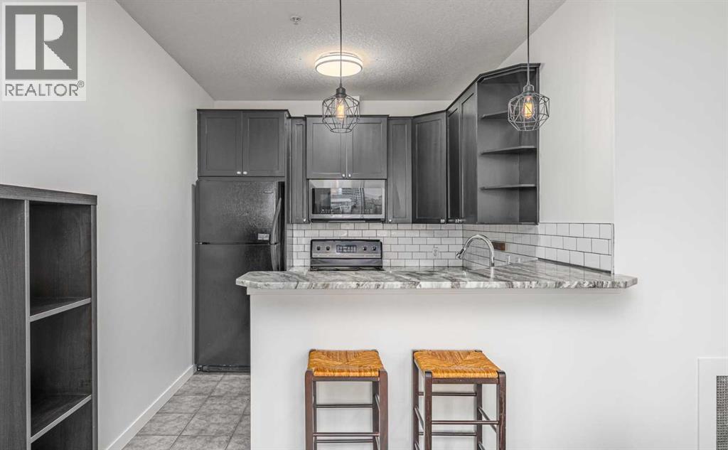 311, 1540 17 Avenue SW