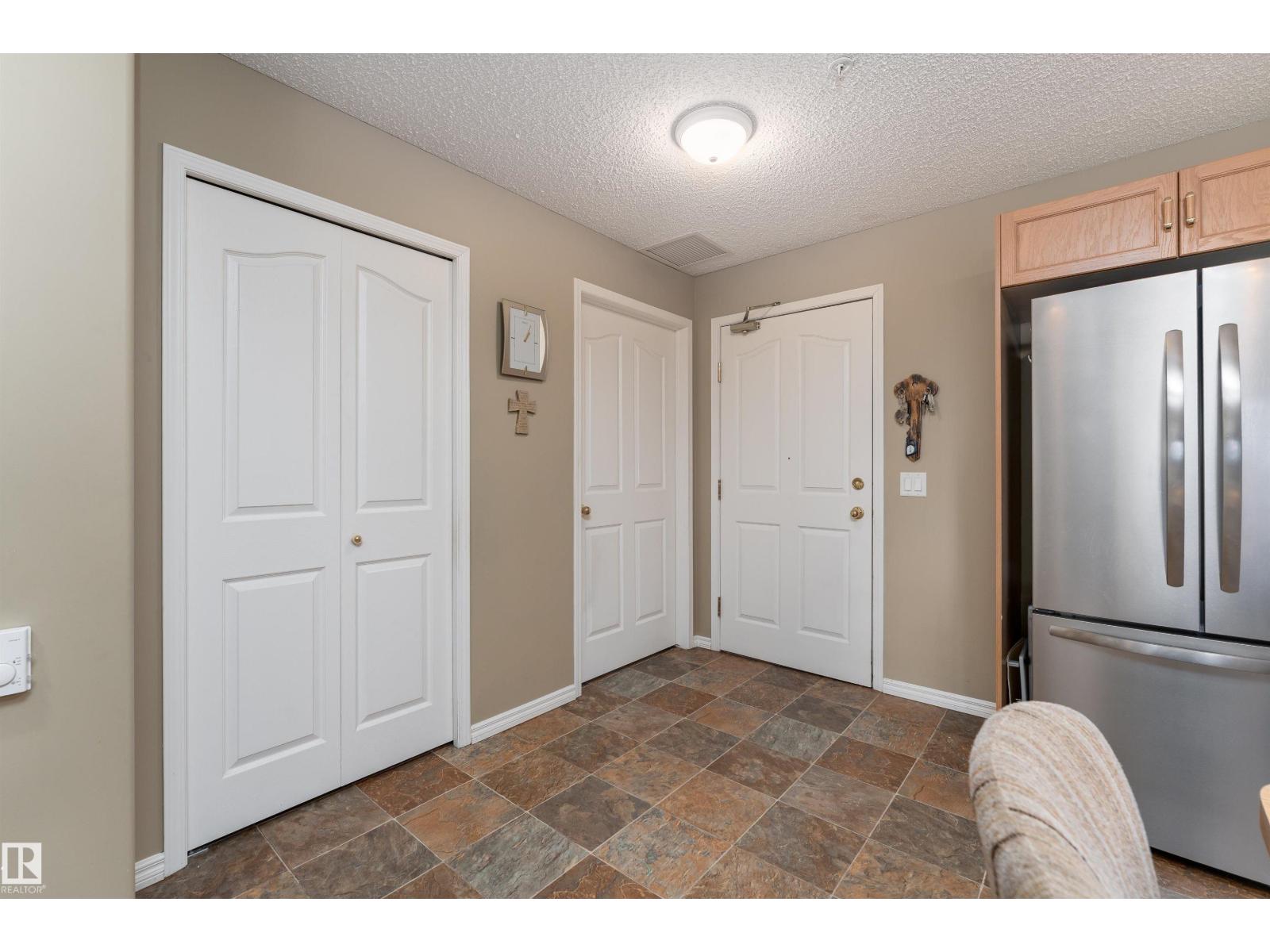#221 16303 95 ST NW