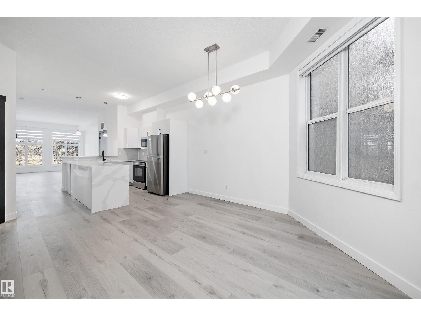 #200 10531 117 ST NW