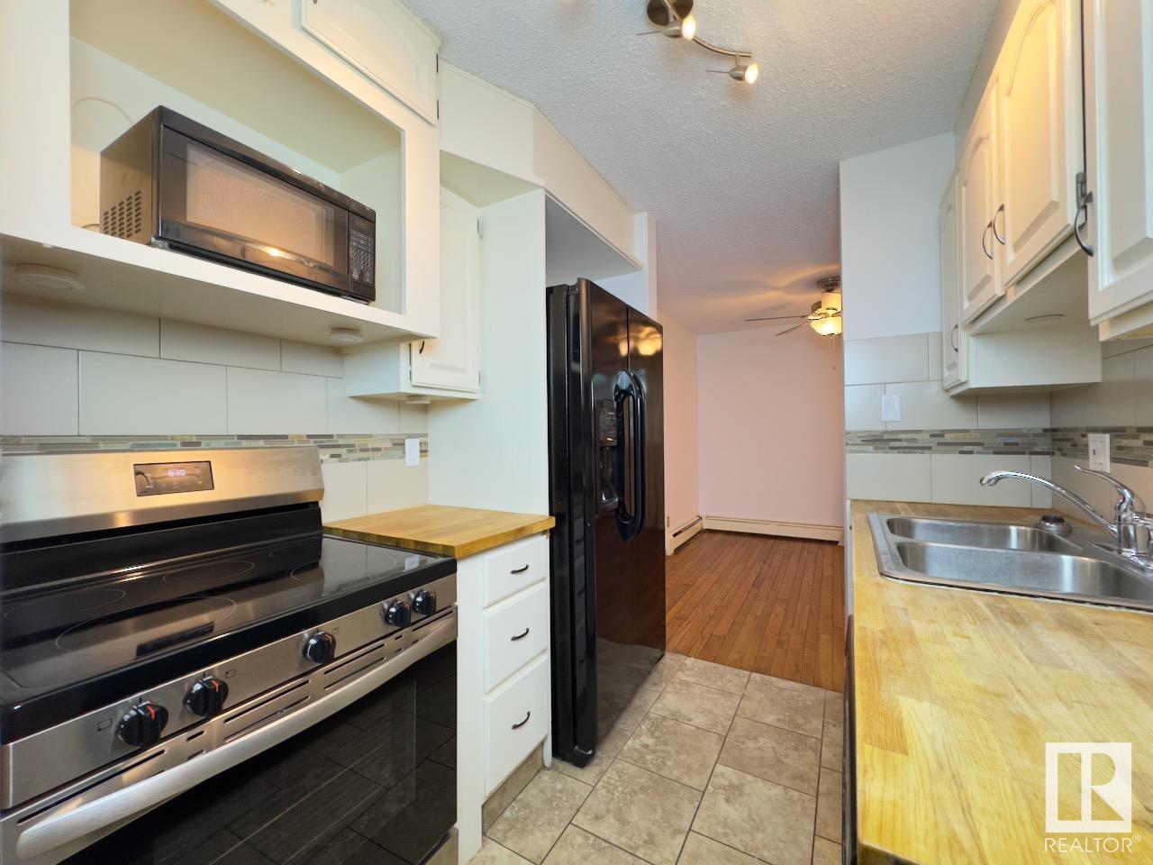 #323 2327 119 ST NW