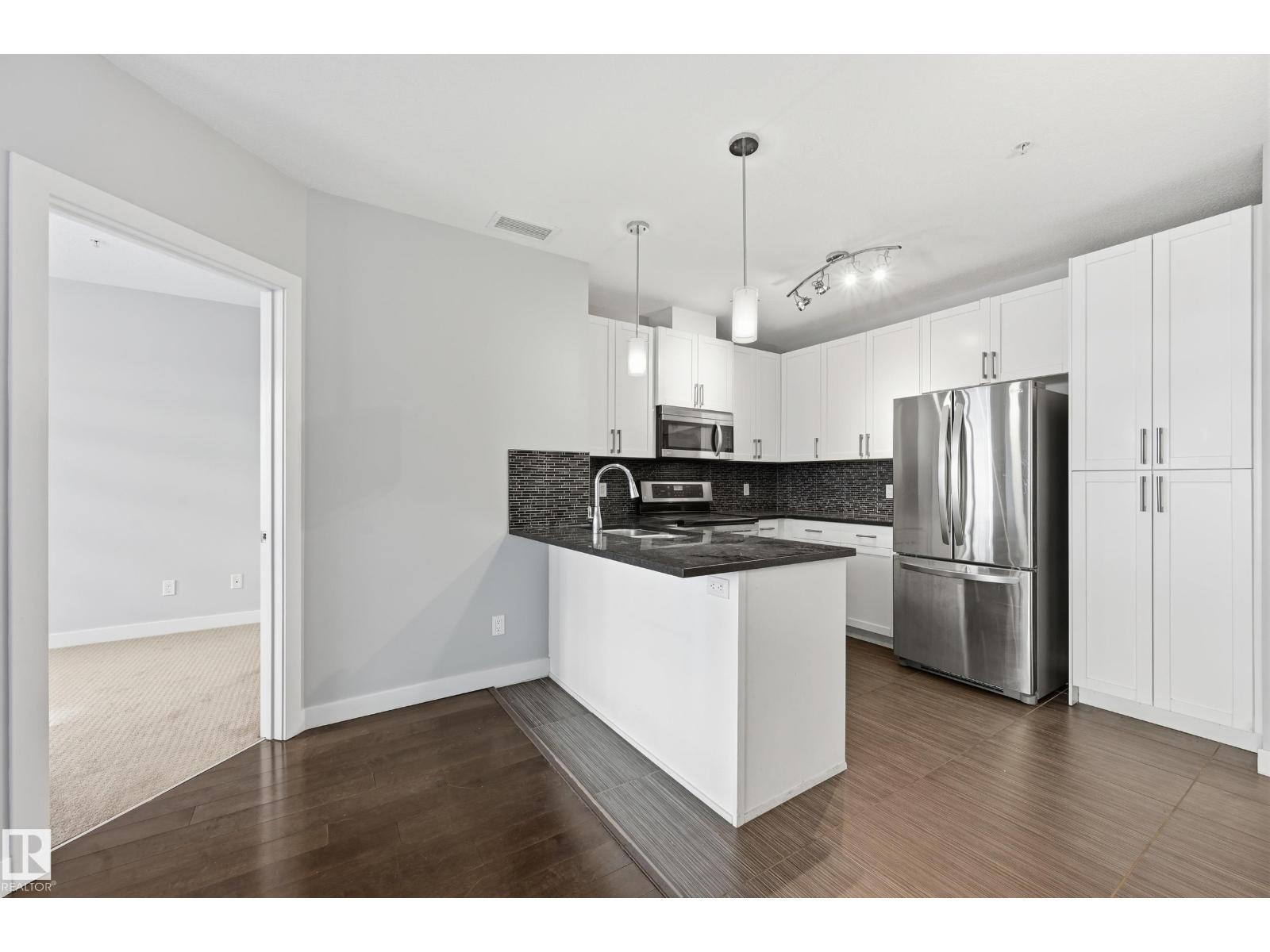 #511 5151 WINDERMERE BV SW