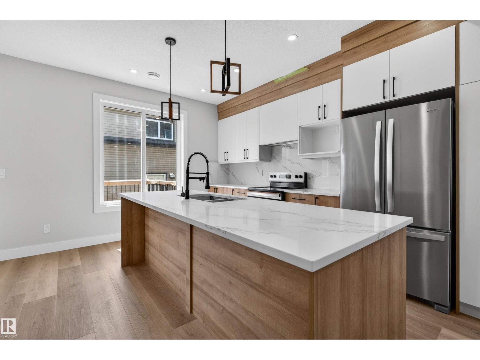 10707-09 128 AV NW
