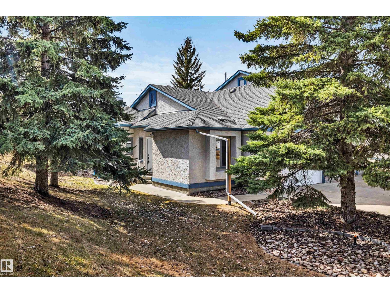 11239 12 AV NW