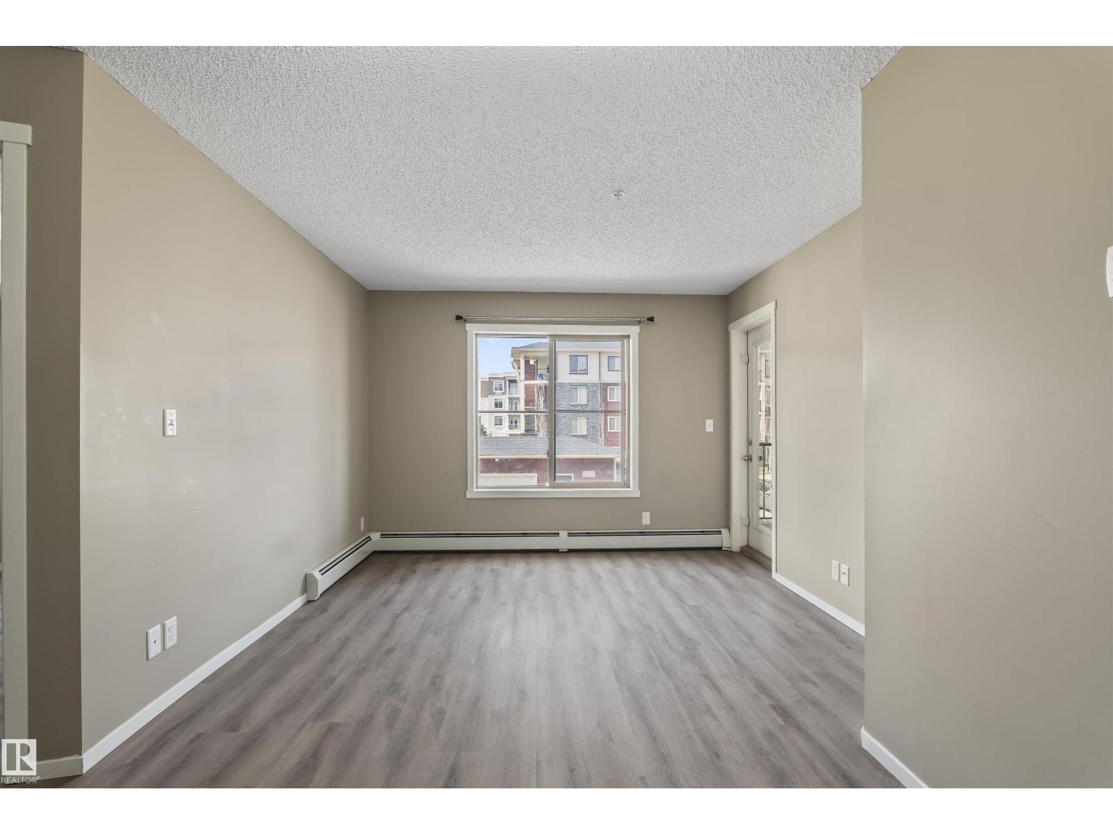 #214 5816 MULLEN PL NW