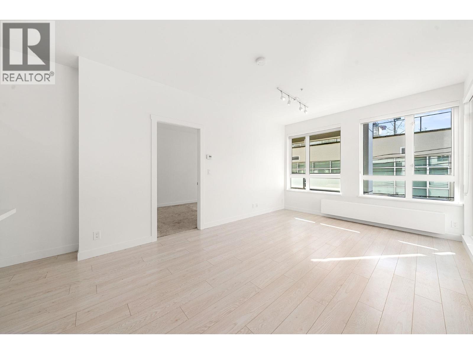 208 711 W 14TH STREET