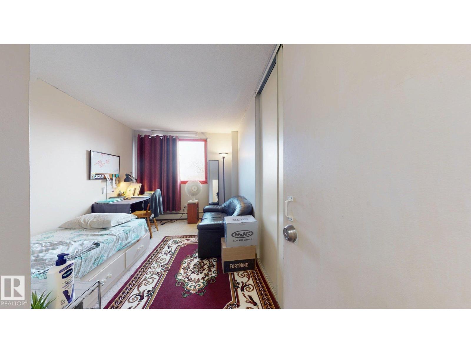 #203 9028 JASPER AV NW