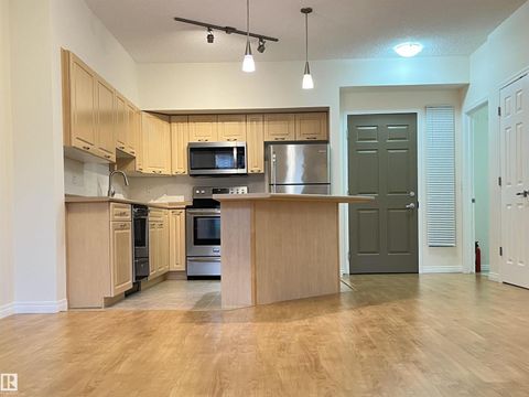 #123 6315 135 AV NW Edmonton AB T5A5J7