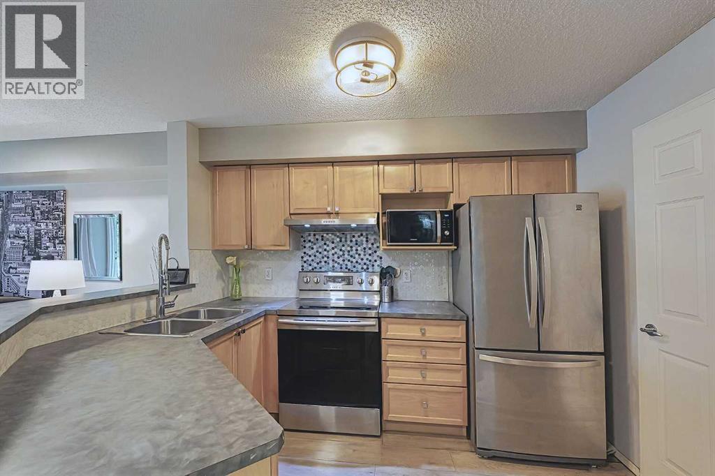 2115, 950 Arbour Lake Road NW