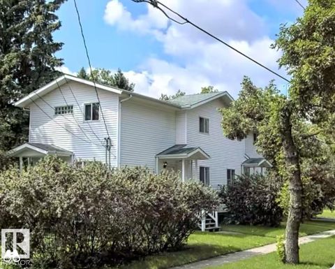 9515B 120 AV NW Edmonton AB T5G3J1