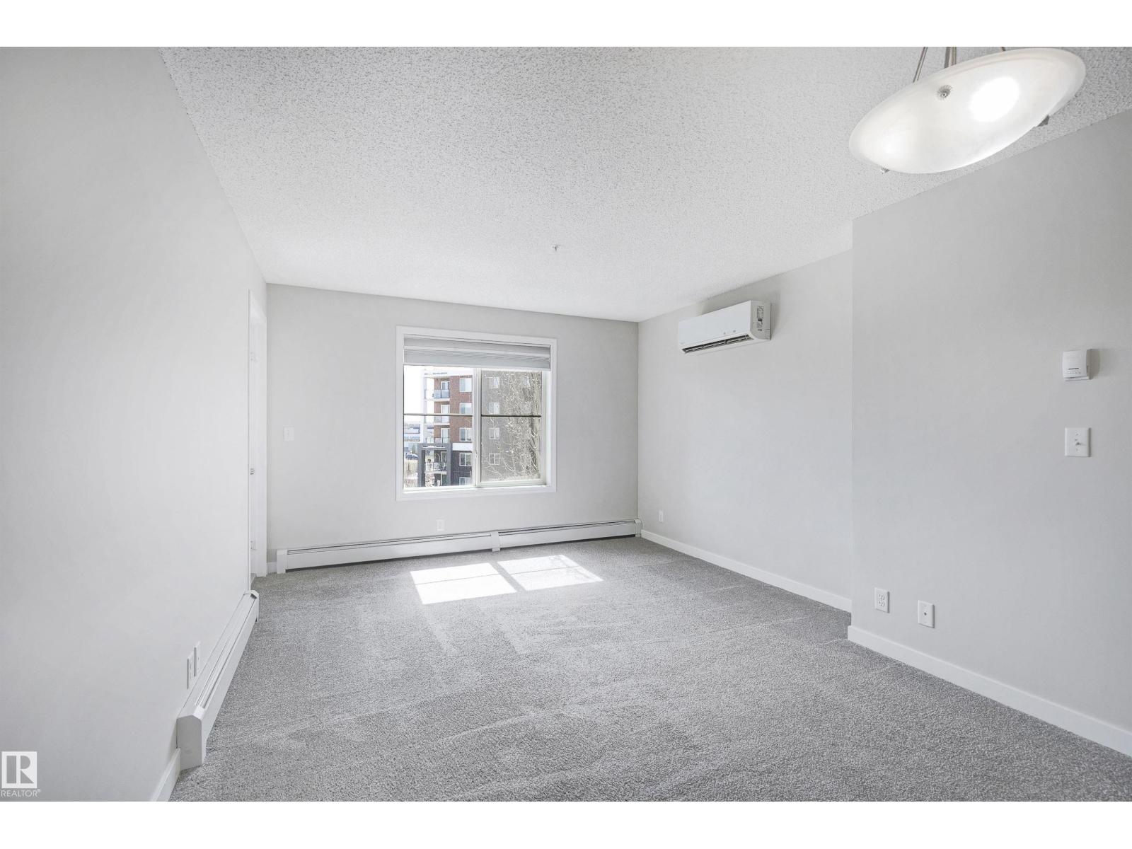#306 12035 22 AV SW