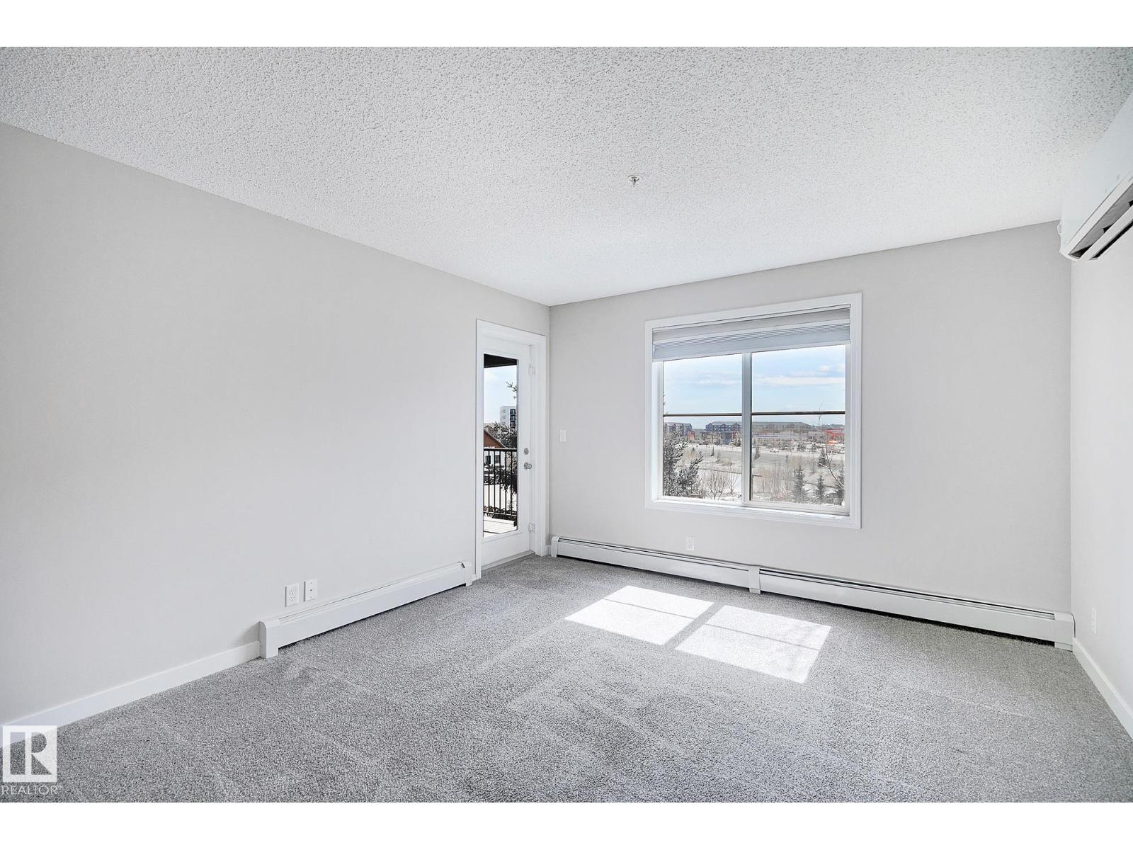 #306 12035 22 AV SW