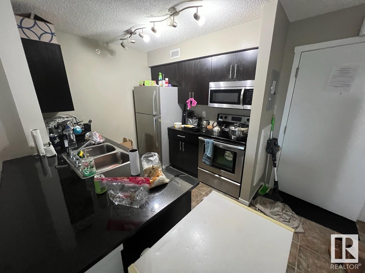 #403 5810 MULLEN PL NW