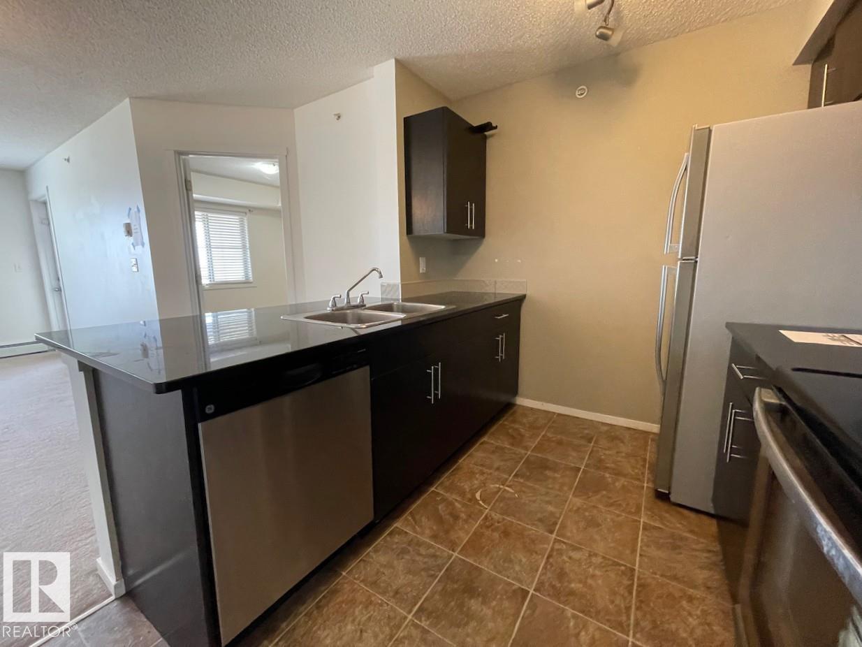 #403 5810 MULLEN PL NW