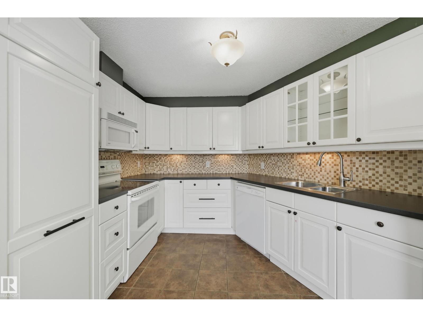 #55 603 YOUVILLE DR E NW