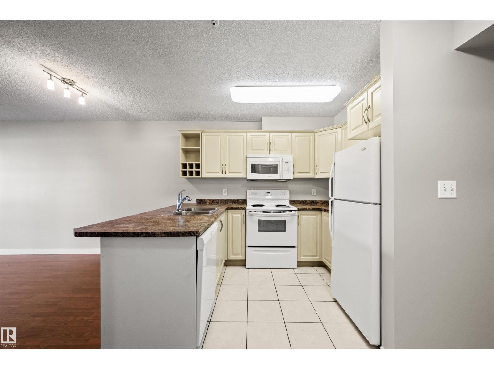 #113 17404 64 AV NW