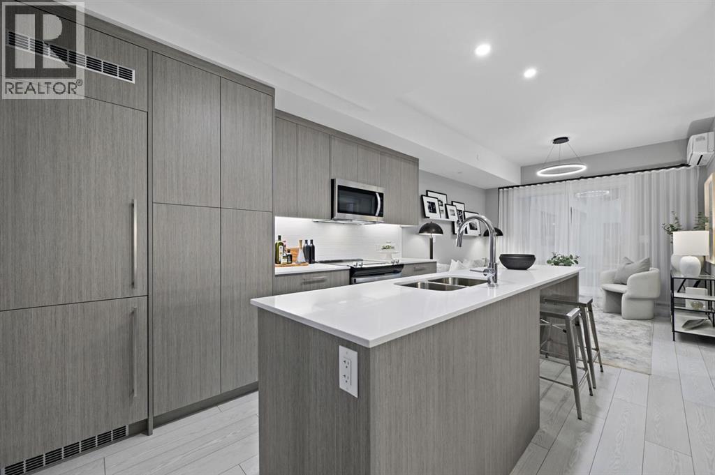 221, 310 15 Avenue SW