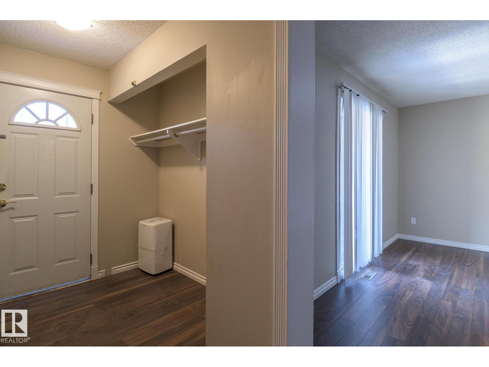 8039 27 AV NW
