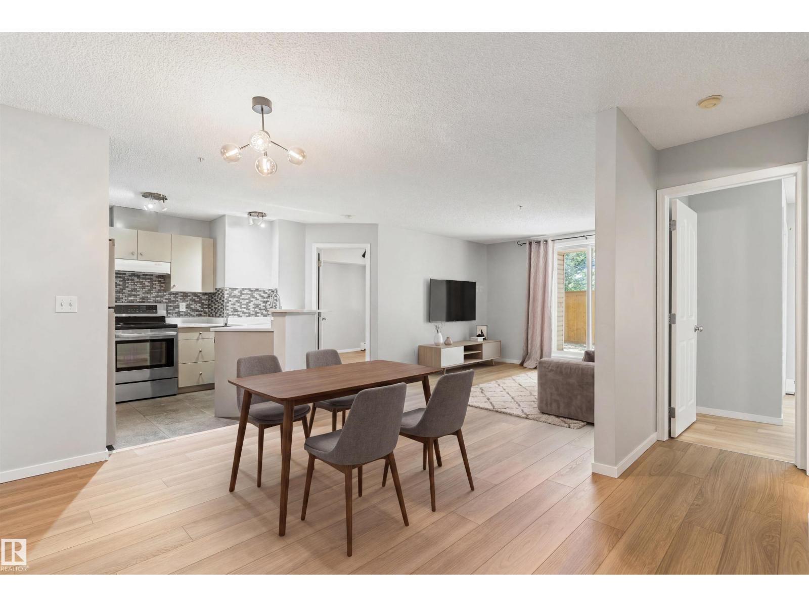#112 11214 80 ST NW