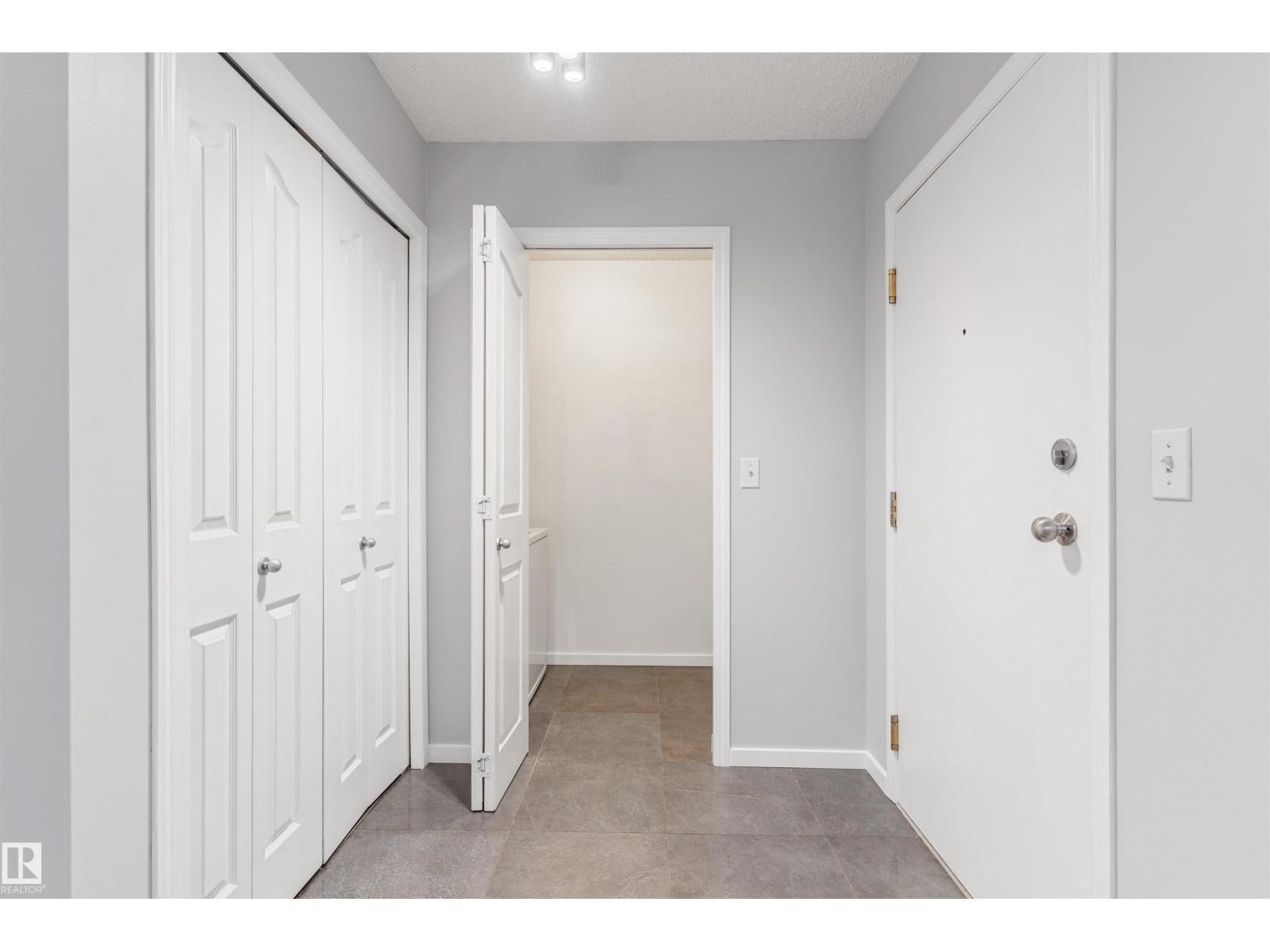 #112 11214 80 ST NW