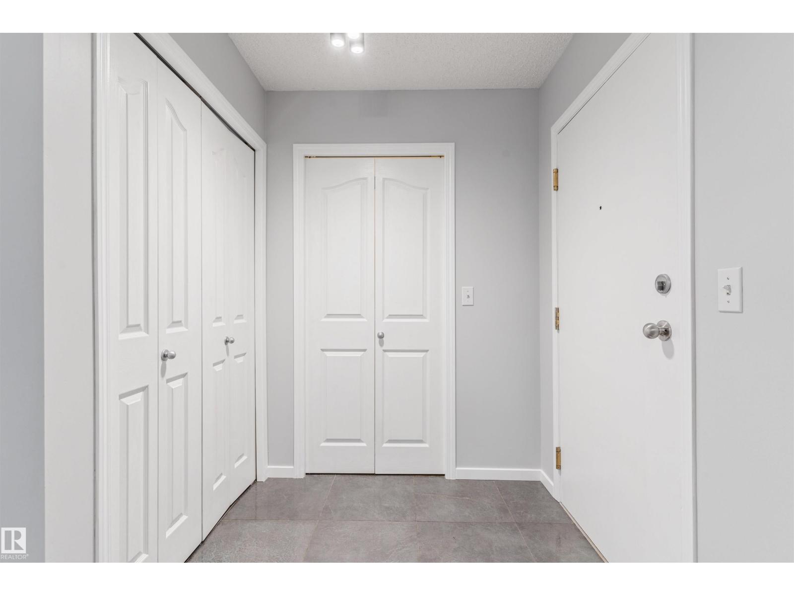 #112 11214 80 ST NW