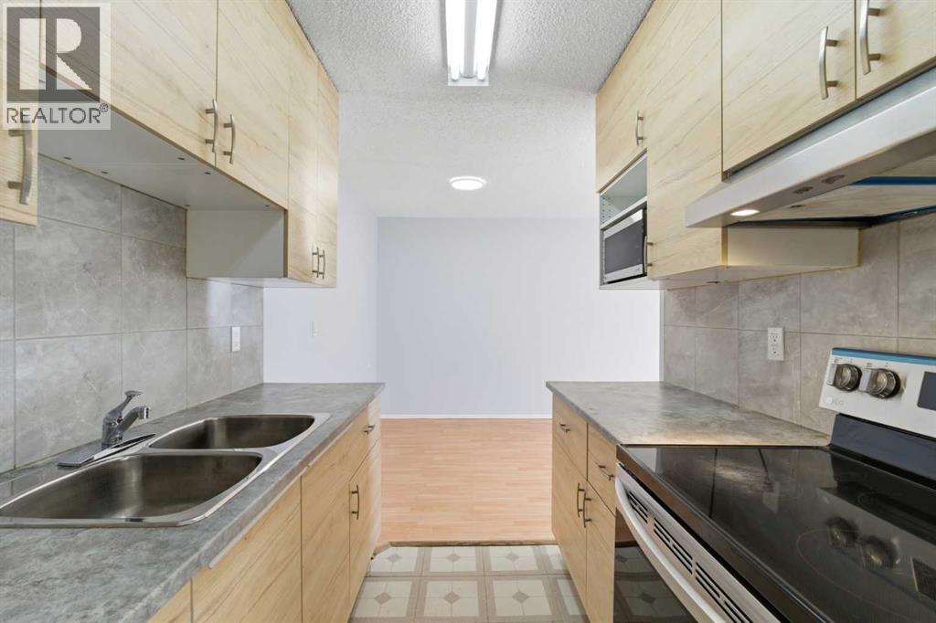 103, 231 64 Avenue NW