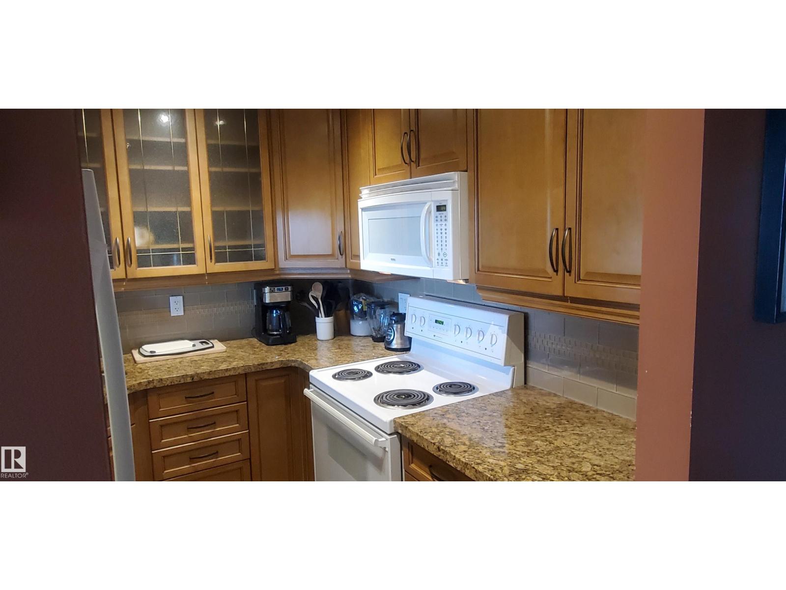 #415 5520 RIVERBEND RD NW