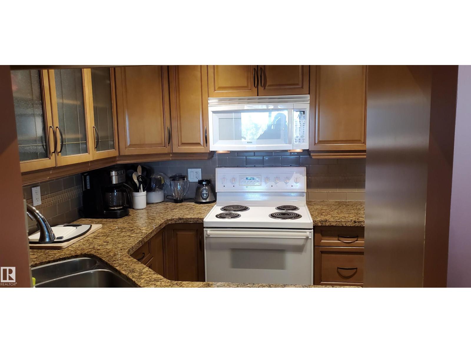 #415 5520 RIVERBEND RD NW