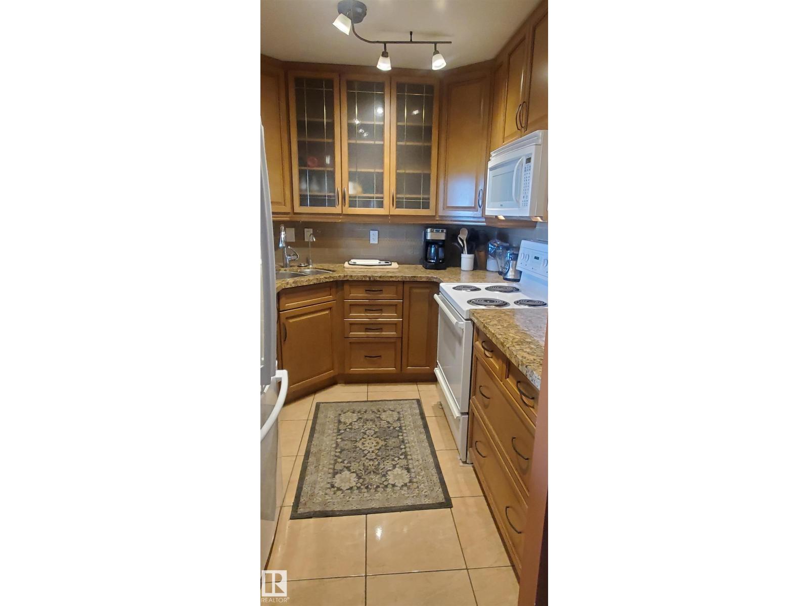 #415 5520 RIVERBEND RD NW