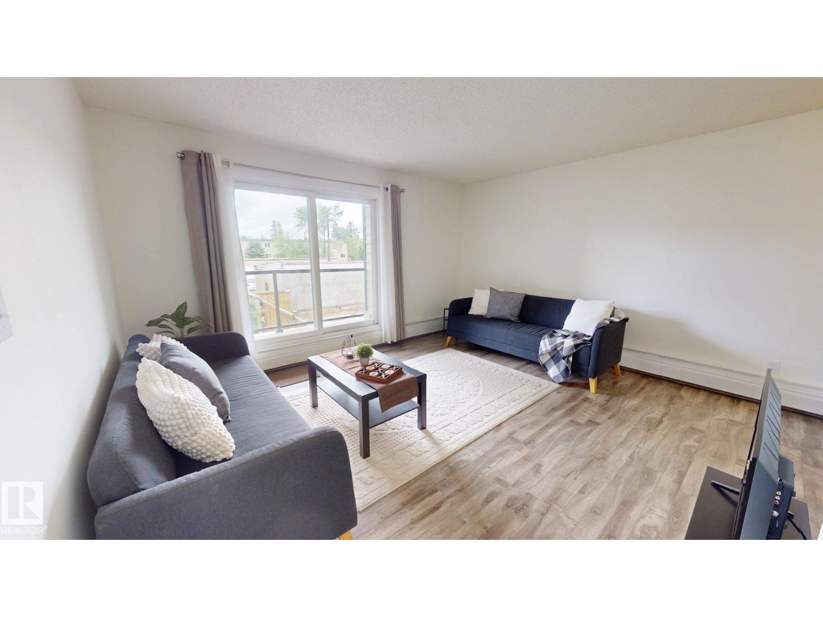 #207 11224 116 ST NW