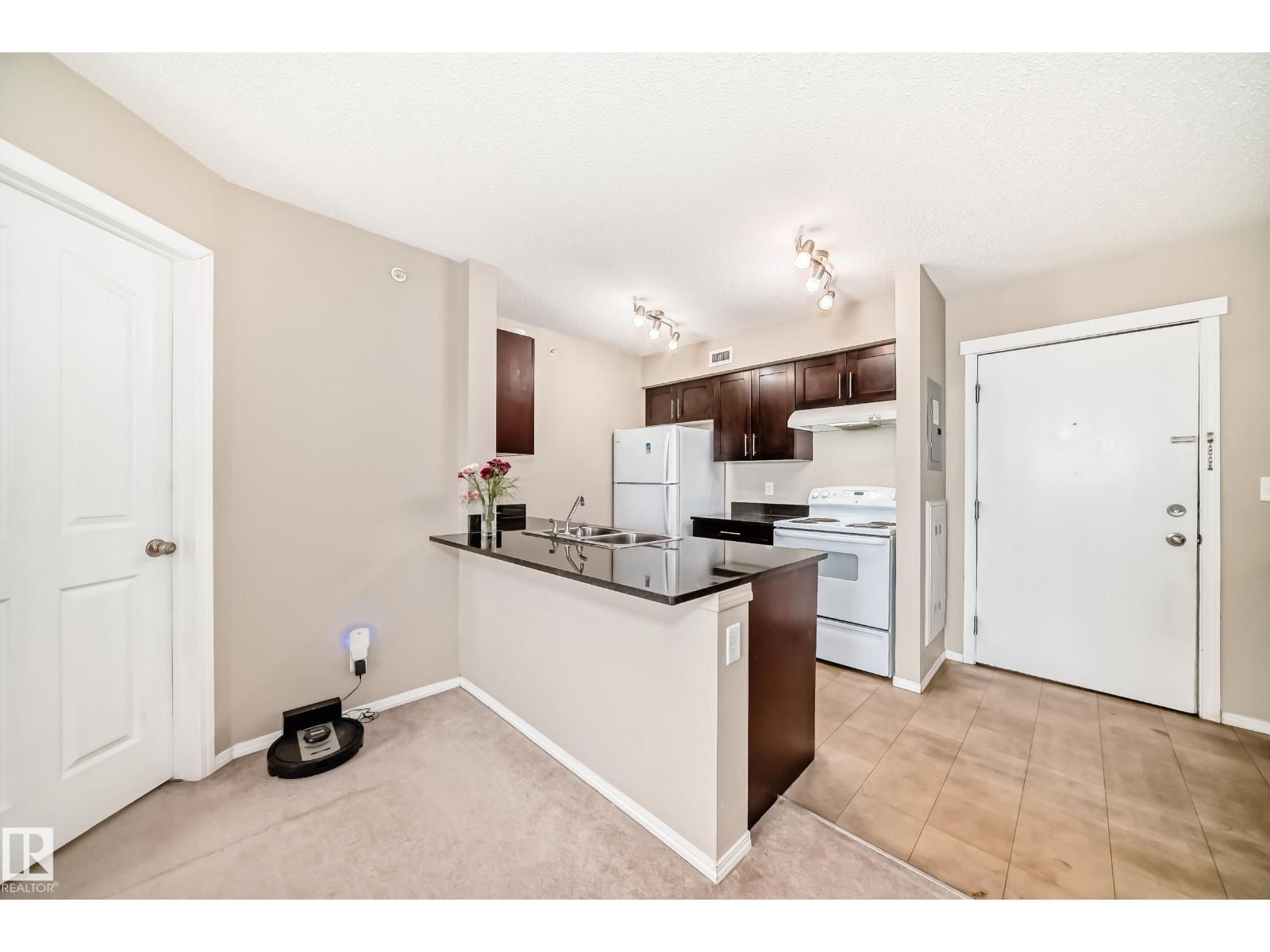 #404 12025 22 AV SW SW