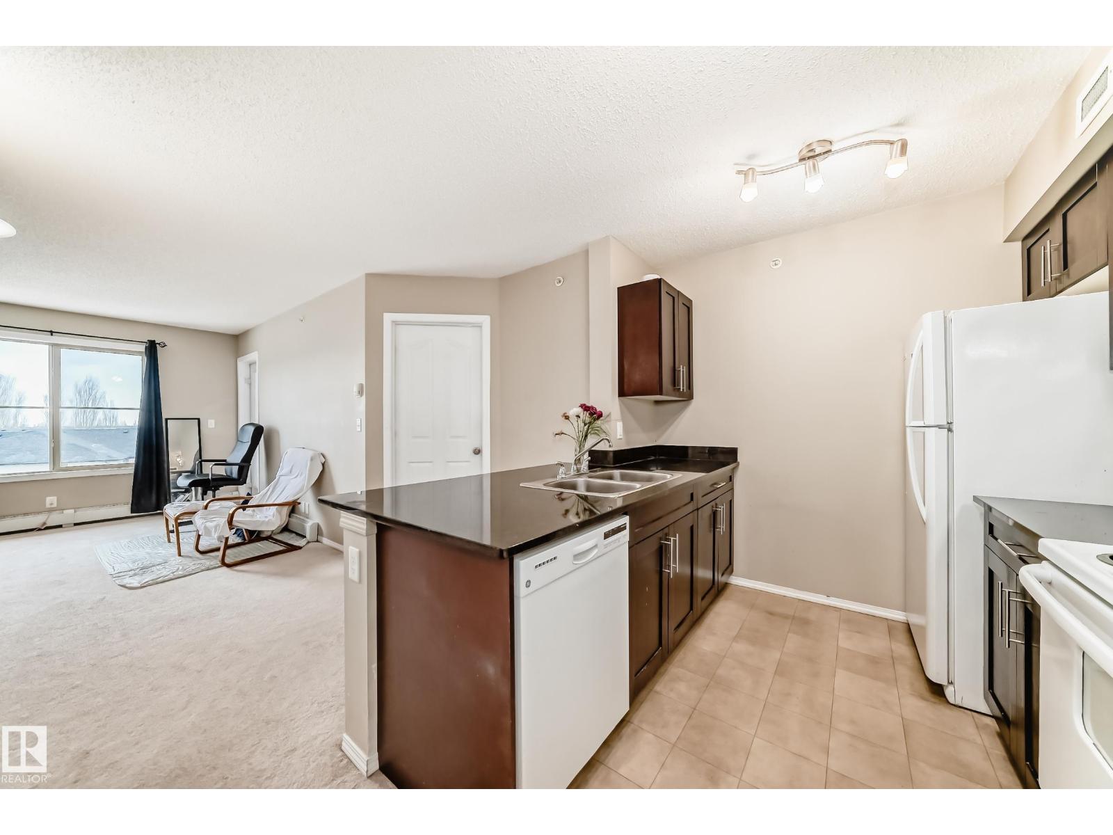 #404 12025 22 AV SW SW