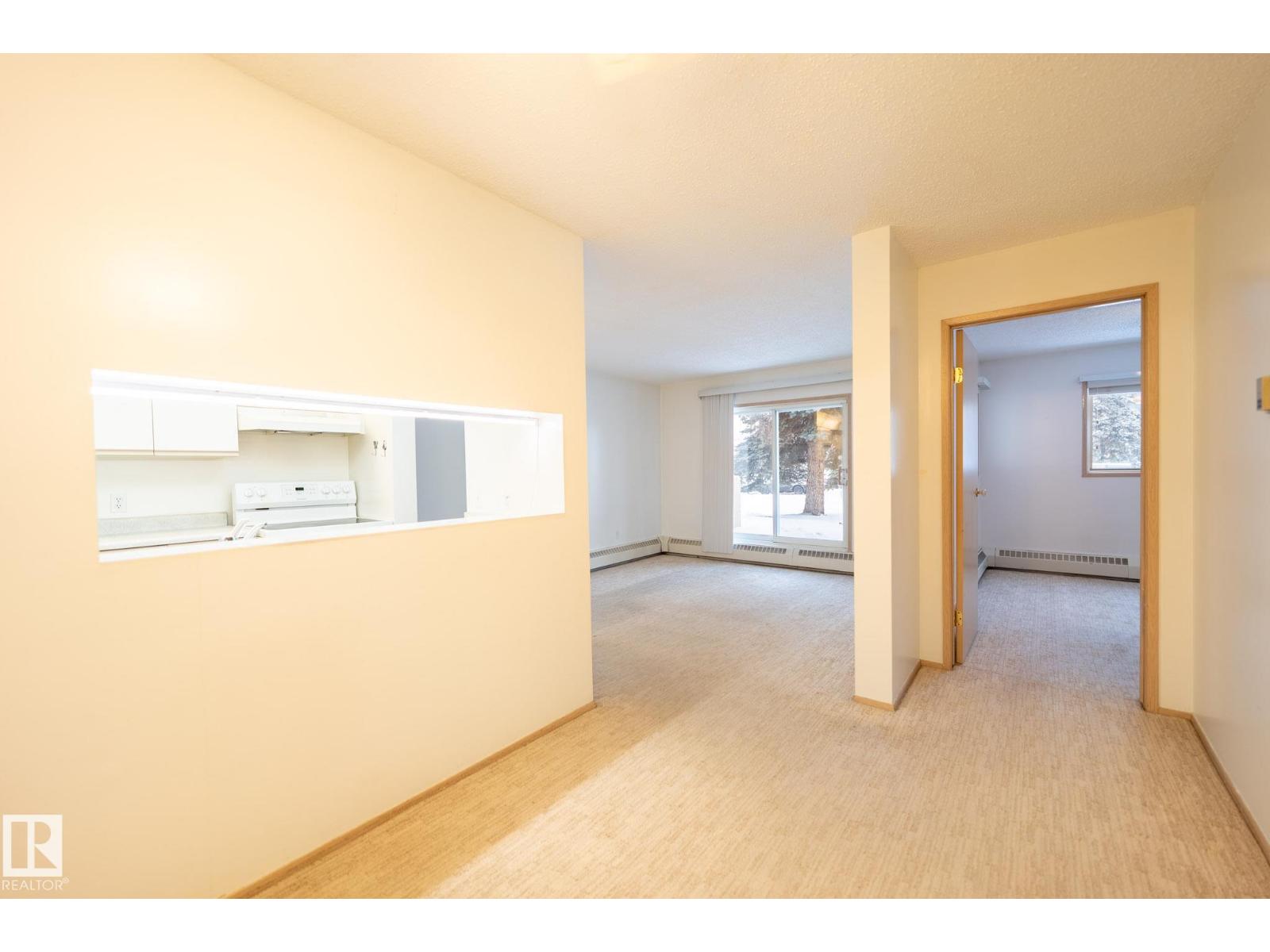 #102 6710 158 AV NW