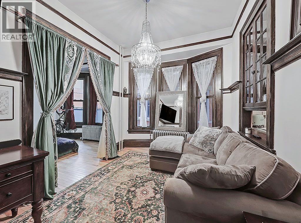 100, 804 18 Avenue SW