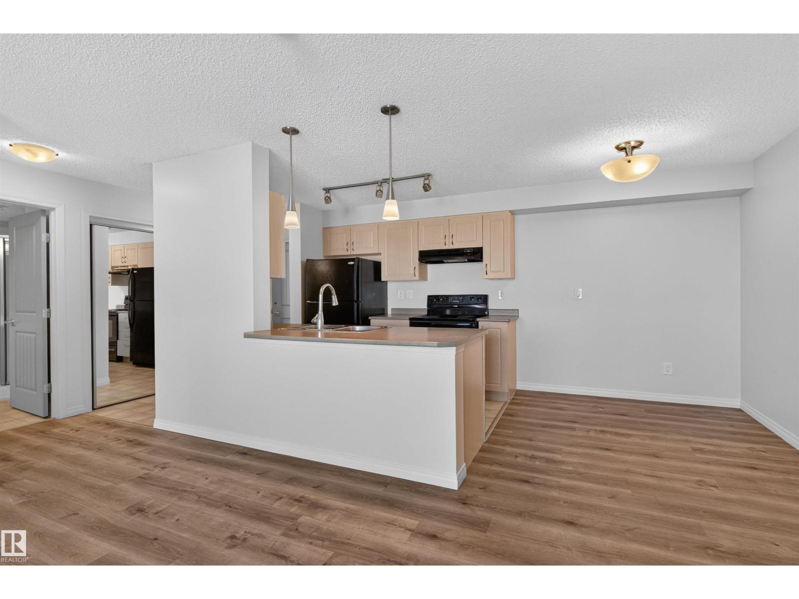 #405 13907 136 ST NW