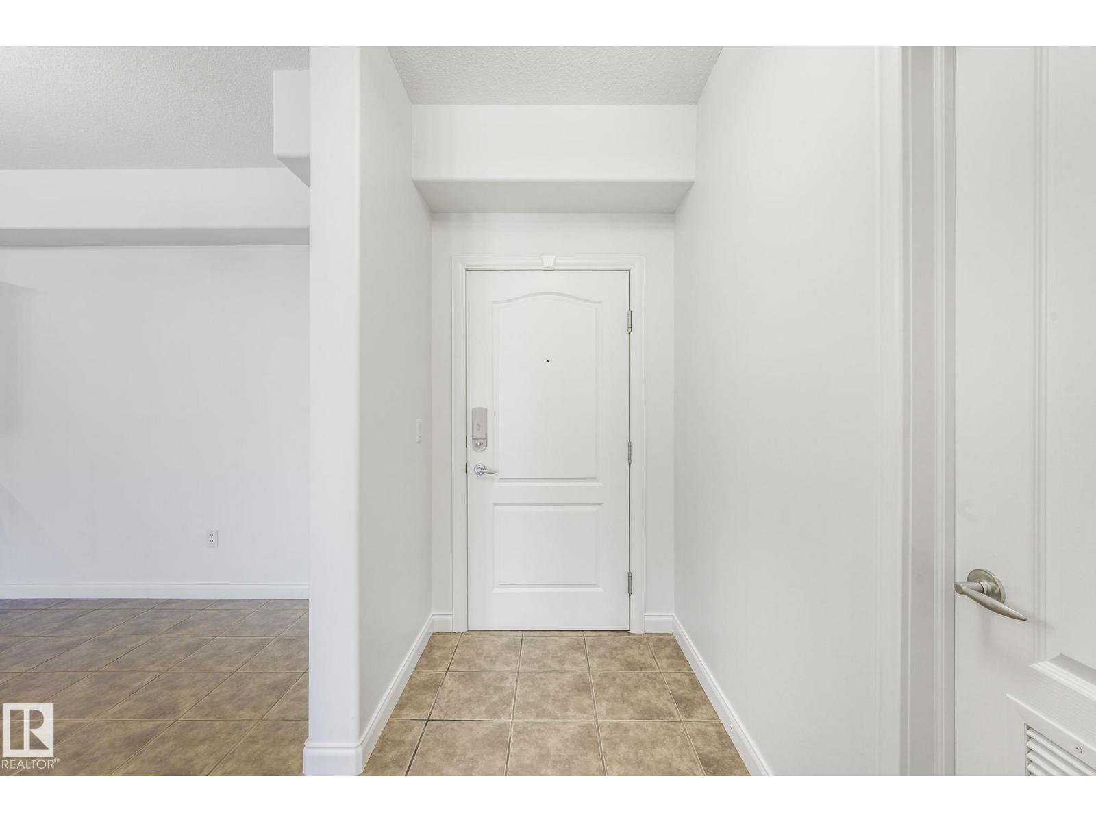 #232 1406 HODGSON WY NW