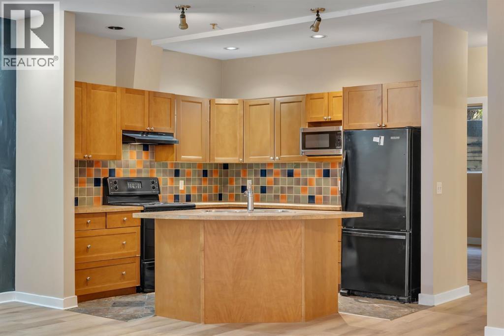 403, 718 5 Street NE