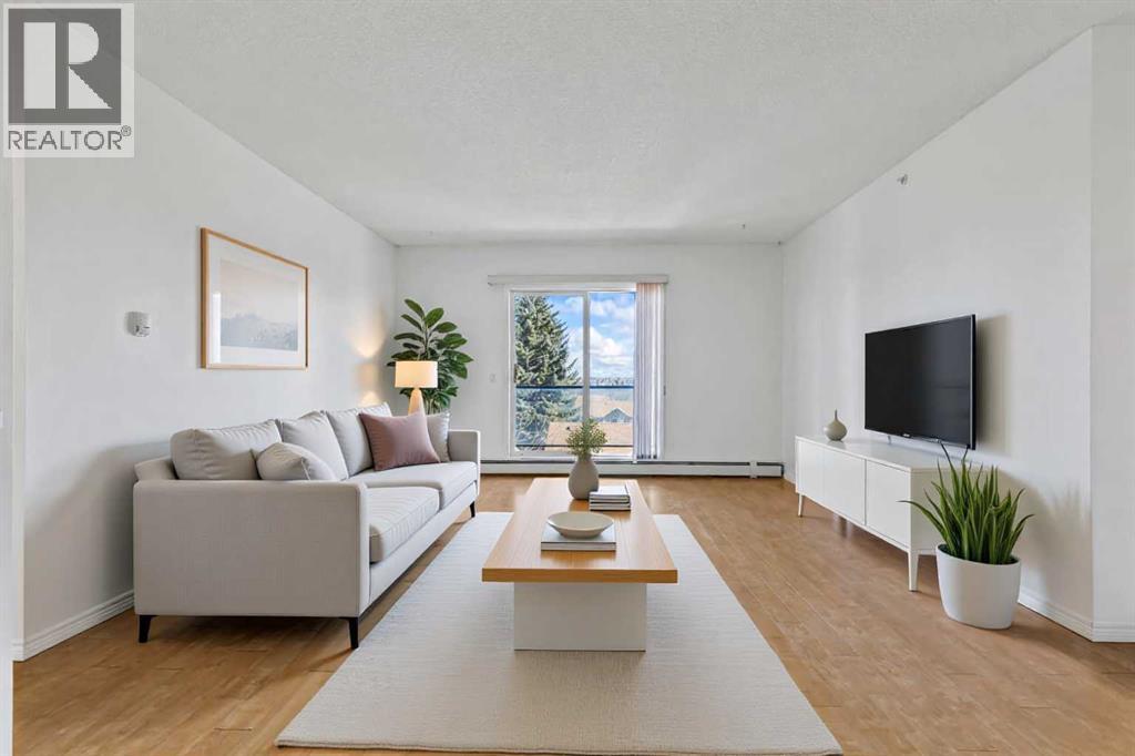 304, 2022 Canyon Meadows Drive SE