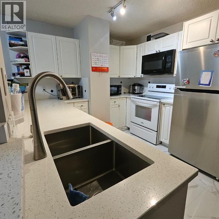 203, 511 56 Avenue SW