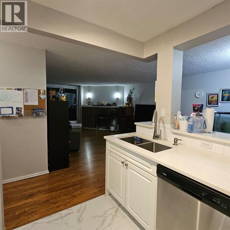 203, 511 56 Avenue SW