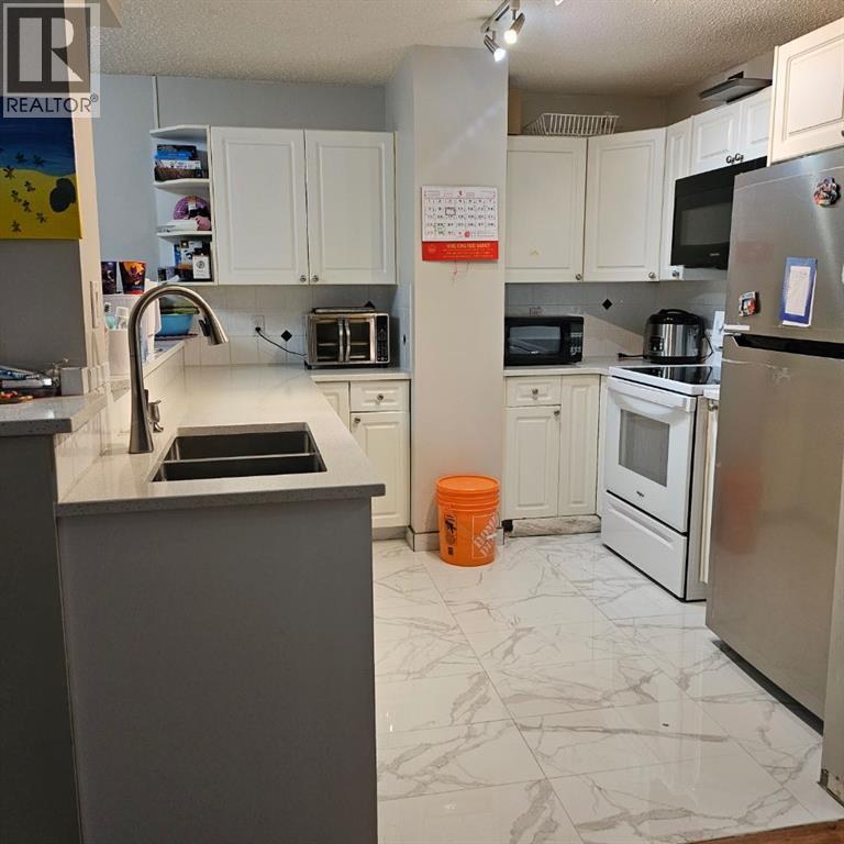 203, 511 56 Avenue SW