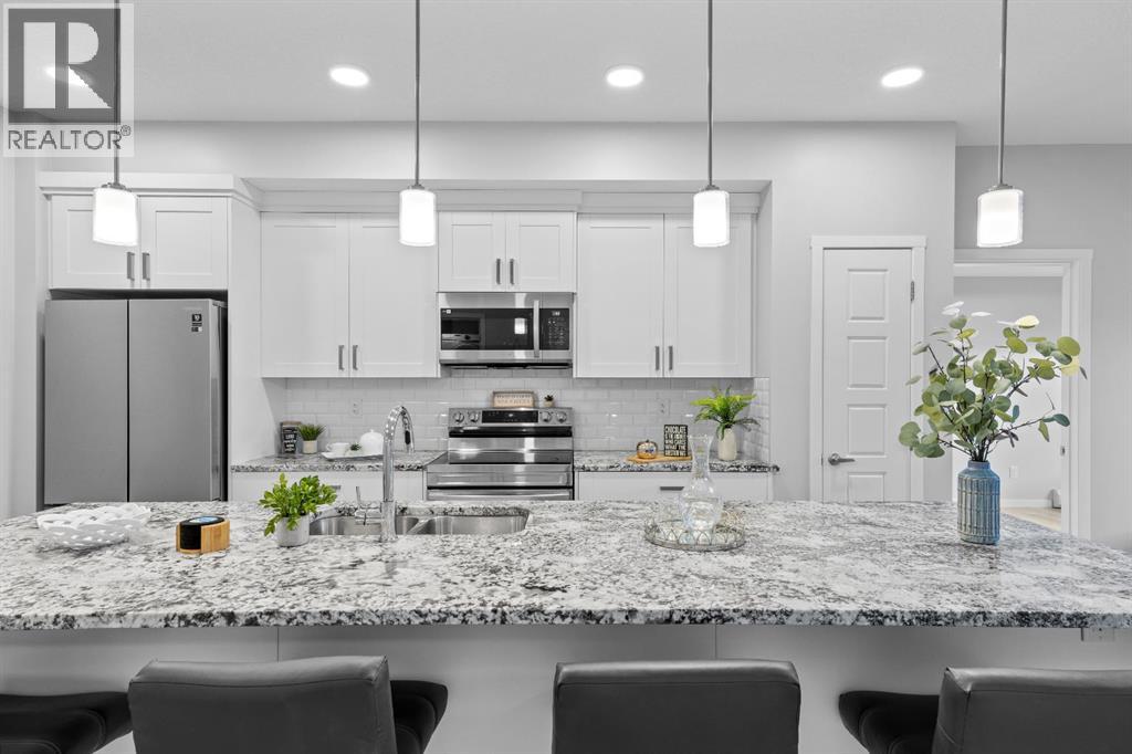 105, 200 Harvest Hills Place NE