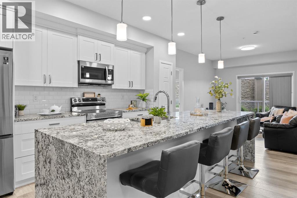 105, 200 Harvest Hills Place NE