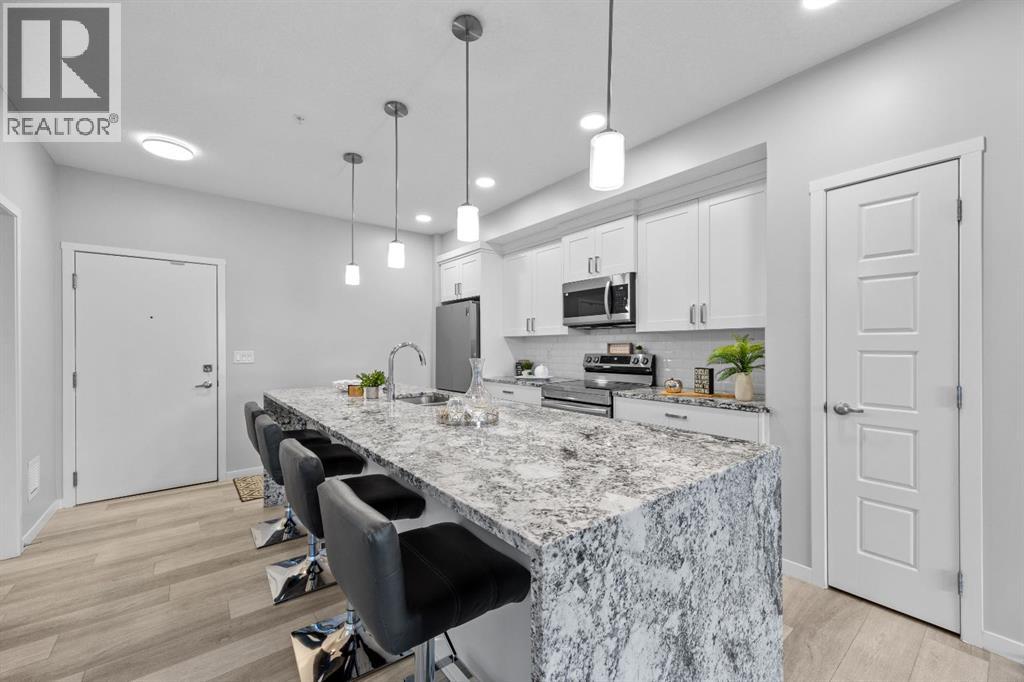 105, 200 Harvest Hills Place NE
