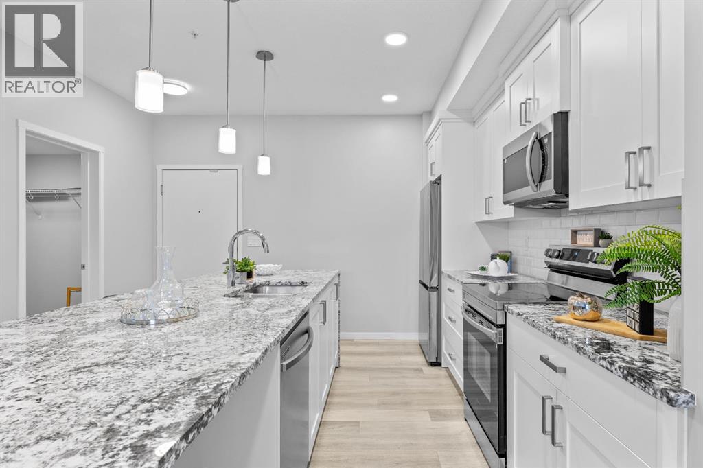 105, 200 Harvest Hills Place NE