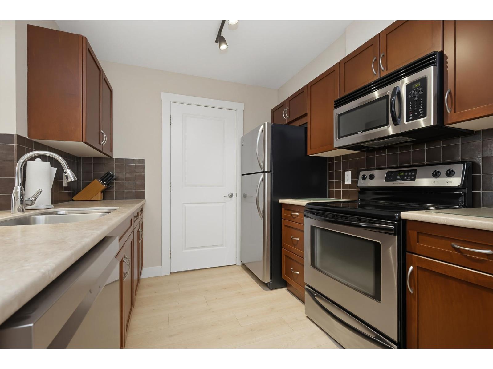 306 2038 SANDALWOOD CRESCENT