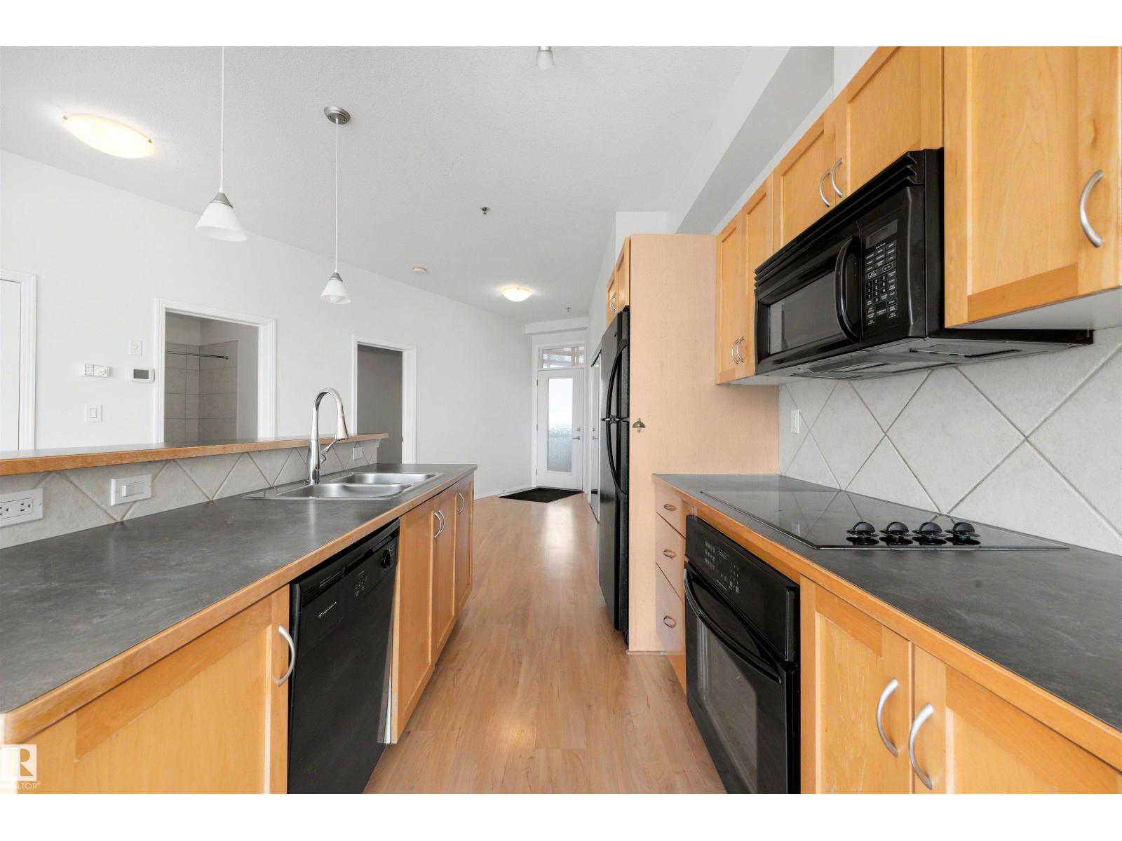 #410 4835 104A ST NW
